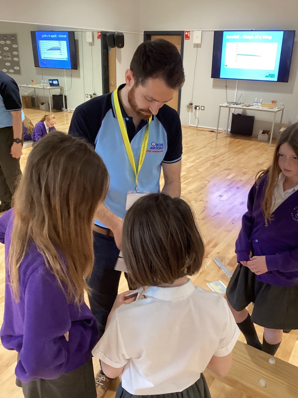  RAF STEM Ambassador works with school children.